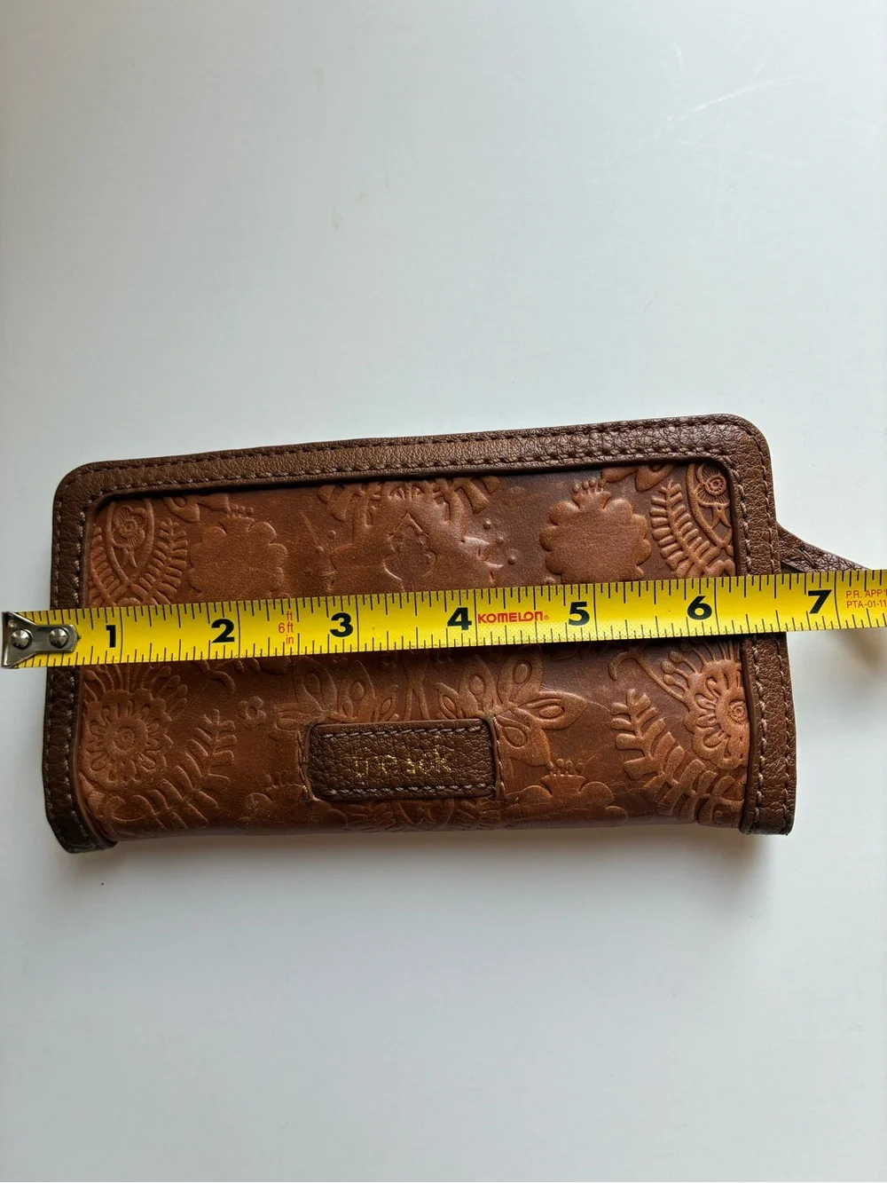 The Sak Tan Brown Embossed Floral Zip Wallet